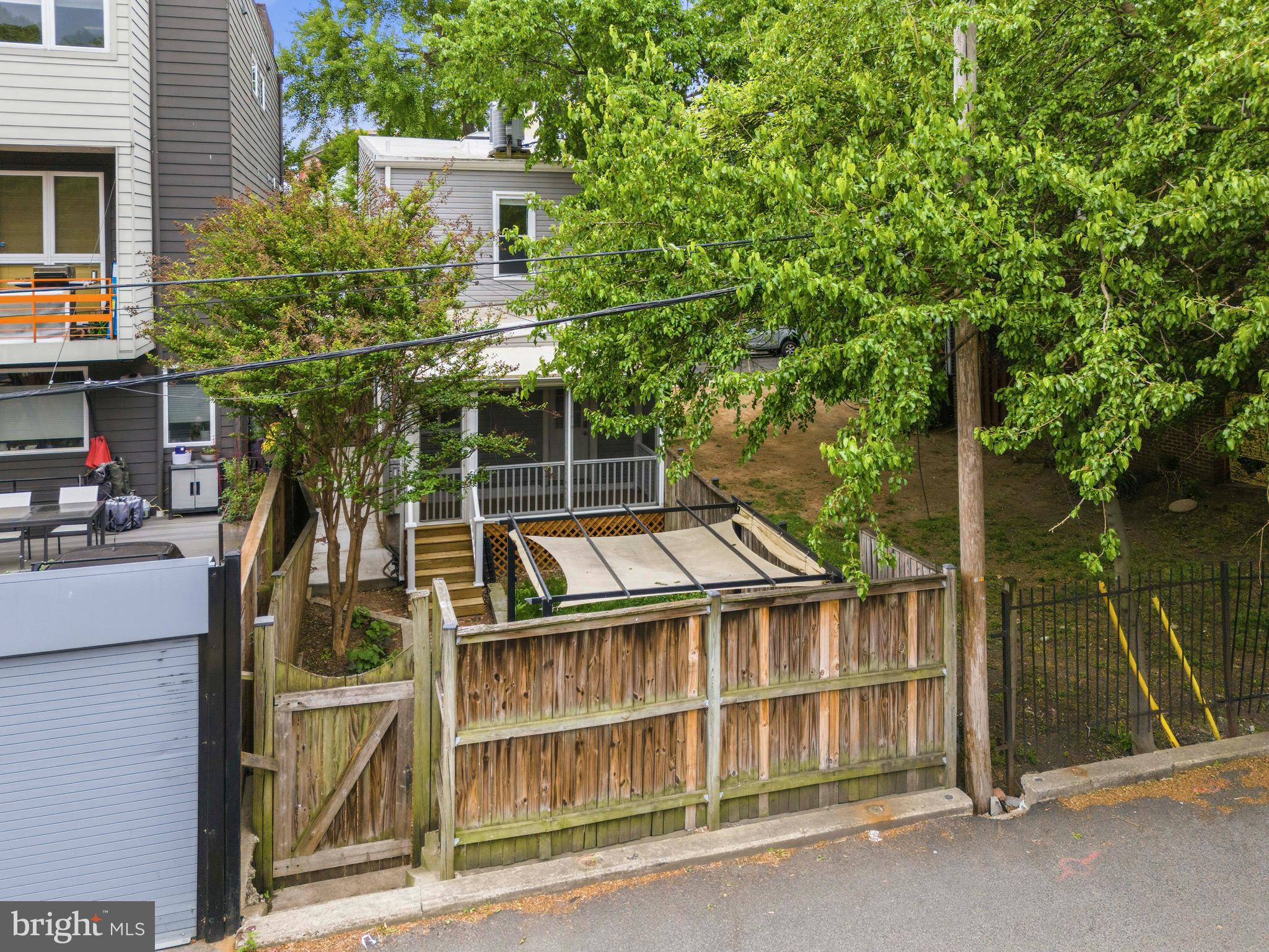 1504 Gales Street Northeast Washington, DC 20002 - Photo 23 of 24 a front view of a house with a garden
