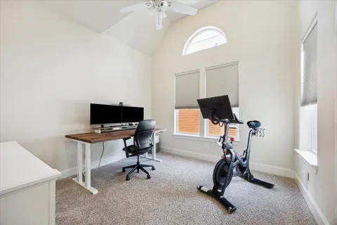 a bathroom with a sink toilet and mirror