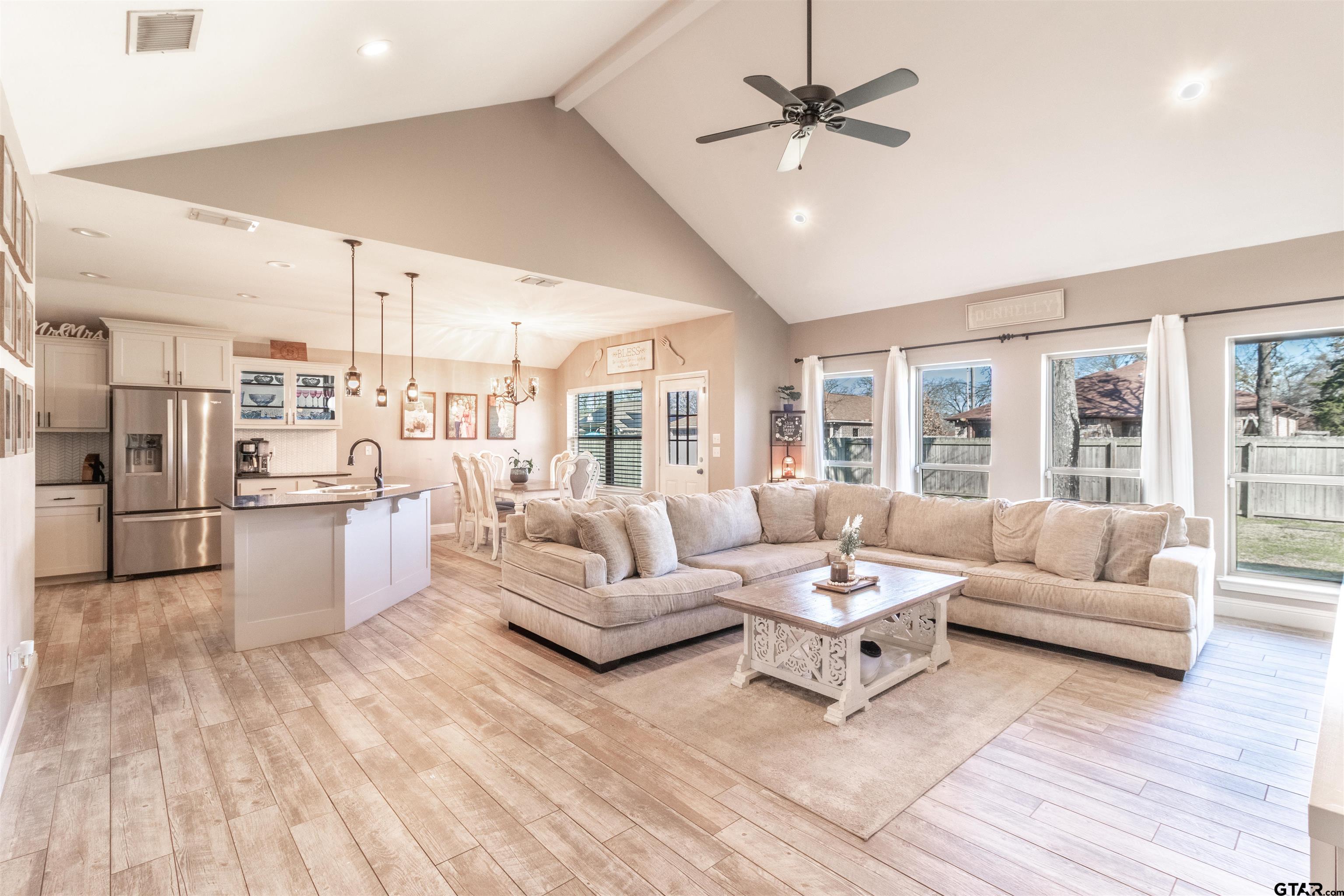 15326 Spring Oaks Drive Lindale, TX 75771 - Photo 15 of 29 a living room with furniture and a view of kitchen