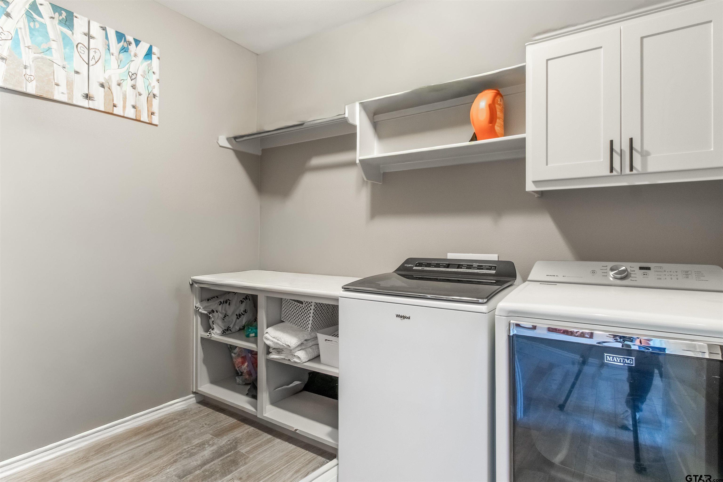 15326 Spring Oaks Drive Lindale, TX 75771 - Photo 21 of 29 a utility room with dryer and washer