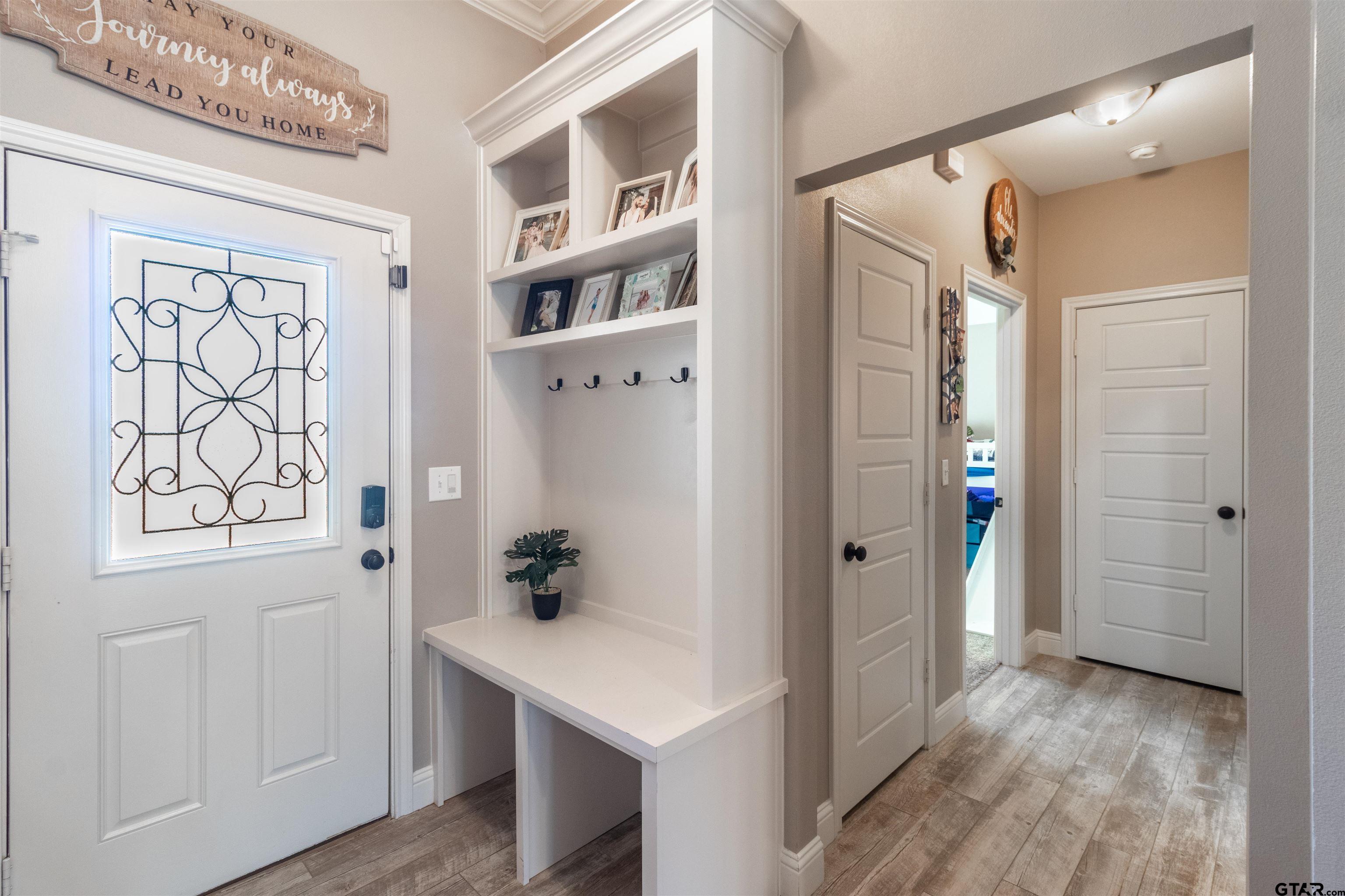 15326 Spring Oaks Drive Lindale, TX 75771 - Photo 5 of 29 a view of an entryway with wooden floor