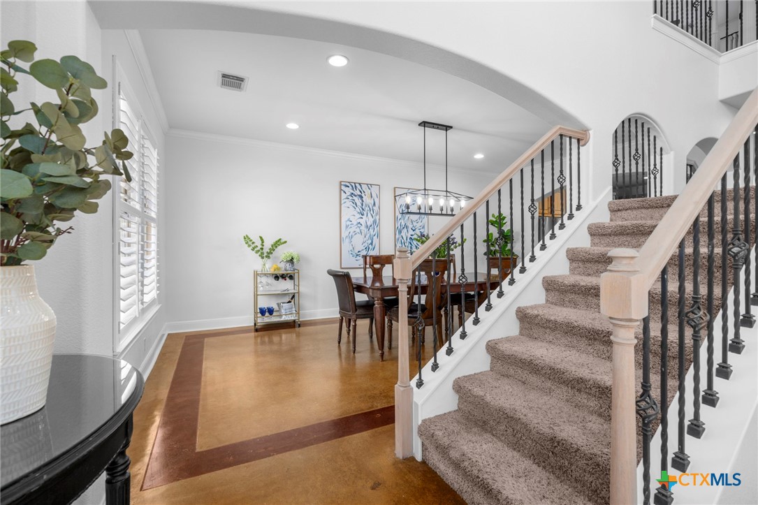 600 Lake Side Cove Georgetown, TX 78628 - Photo 13 of 48 a view of entryway and hall with wooden floor