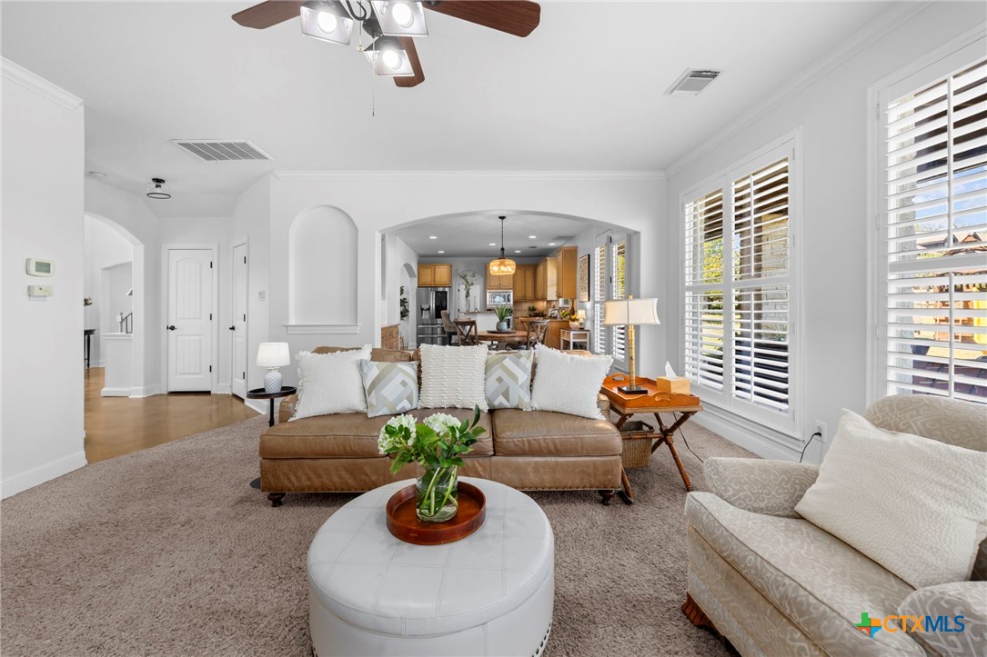 600 Lake Side Cove Georgetown, TX 78628 - Photo 24 of 48 a living room with furniture and a large window