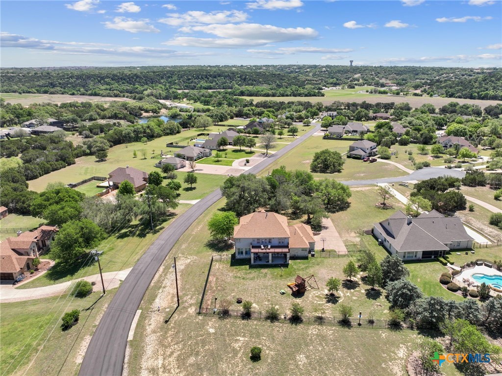 600 Lake Side Cove Georgetown, TX 78628 - Photo 47 of 48 an aerial view of residential houses with outdoor space