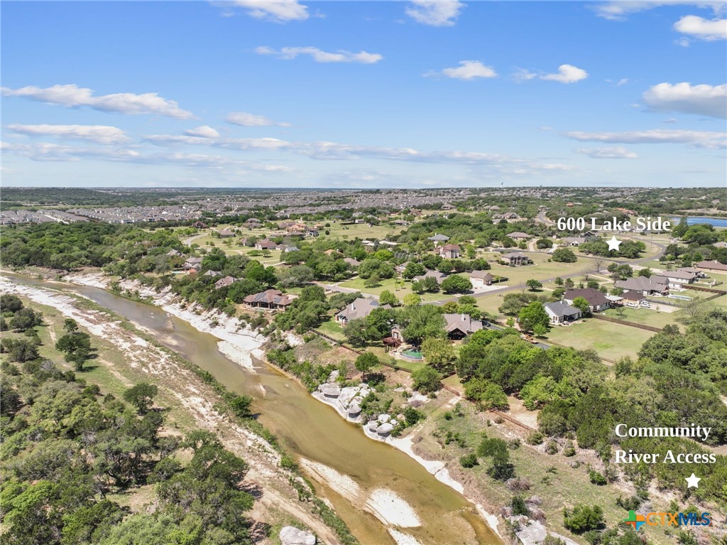 600 Lake Side Cove Georgetown, TX 78628 - Photo 6 of 48 an aerial view of residential building with parking space
