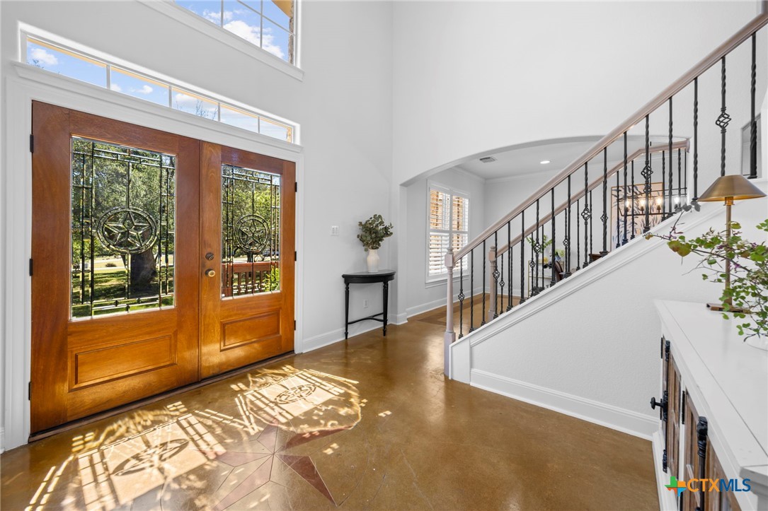 600 Lake Side Cove Georgetown, TX 78628 - Photo 10 of 48 a view of an entryway with wooden floor
