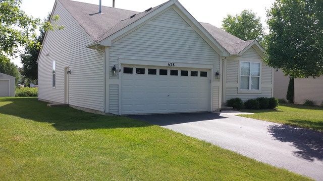 638 Graham Road North Aurora, IL 60542 - Photo 2 of 14 a view of a house with a yard