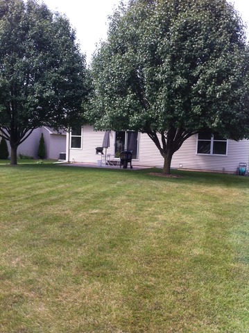 638 Graham Road North Aurora, IL 60542 - Photo 11 of 14 a view of a house with a yard