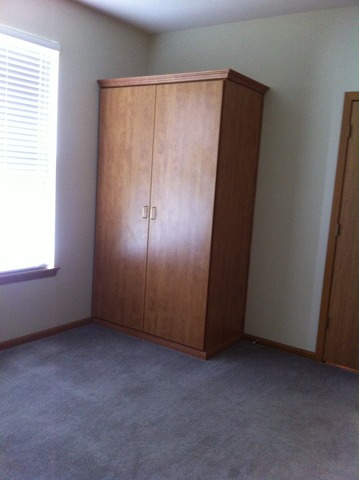 638 Graham Road North Aurora, IL 60542 - Photo 8 of 14 an empty room with a window