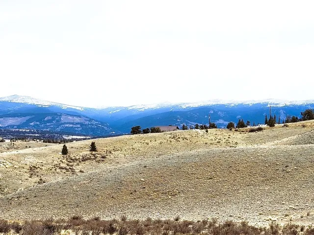 a view of city and mountain