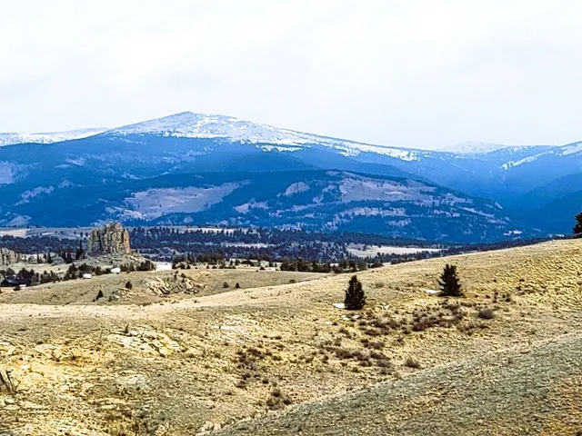 a view of ocean and mountain