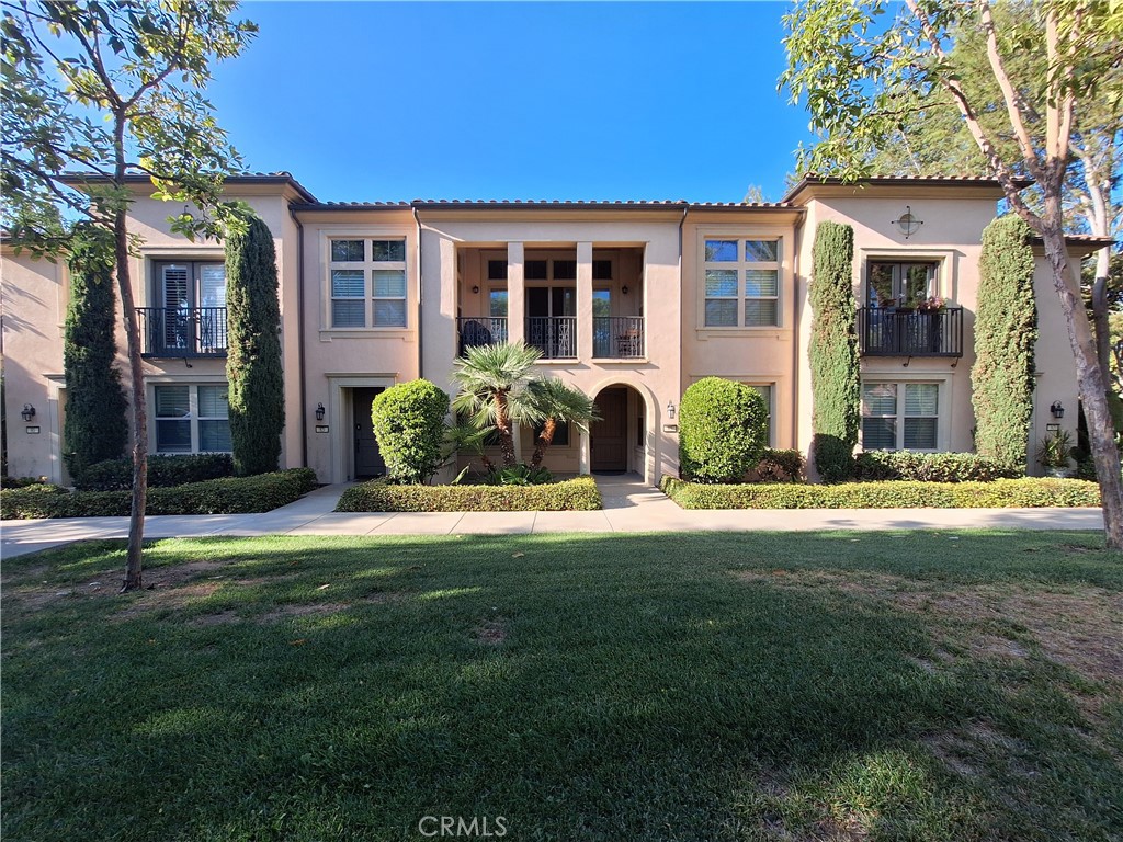 85 City Stroll Irvine, CA 92620 - Photo 1 of 1 a house view with a garden space