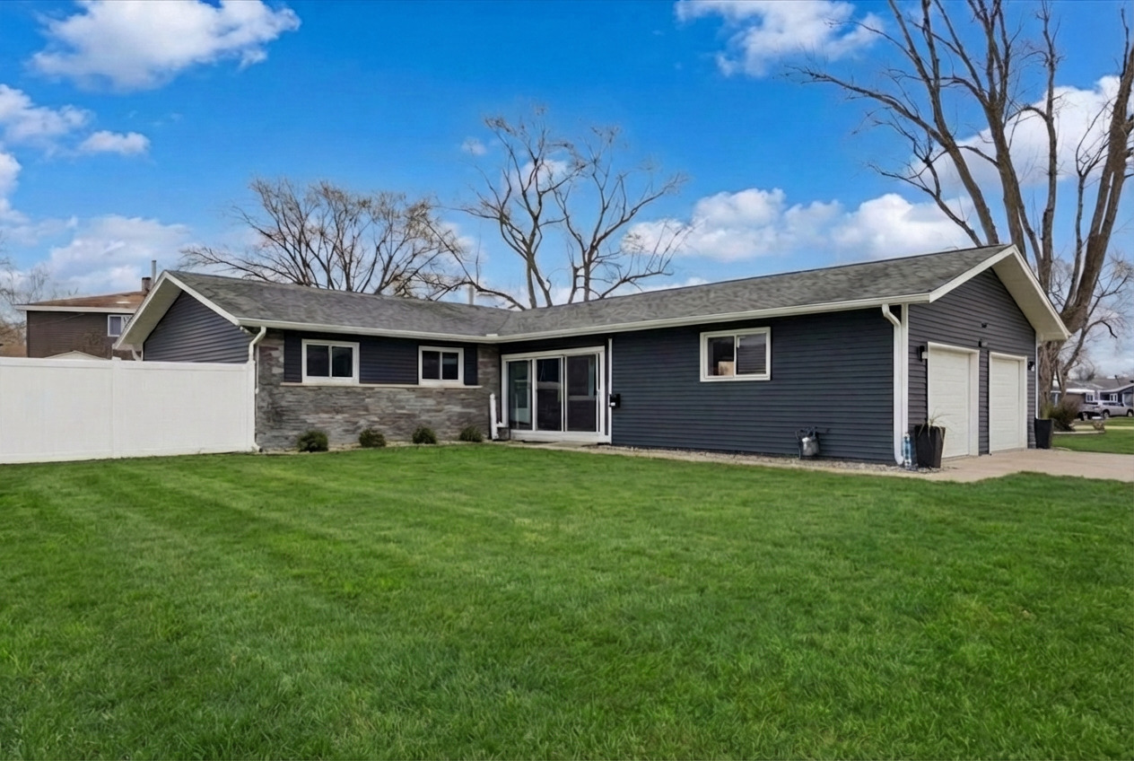 1109 Edson Avenue Lombard, IL 60148 - Photo 1 of 20 a front view of a house with a garden