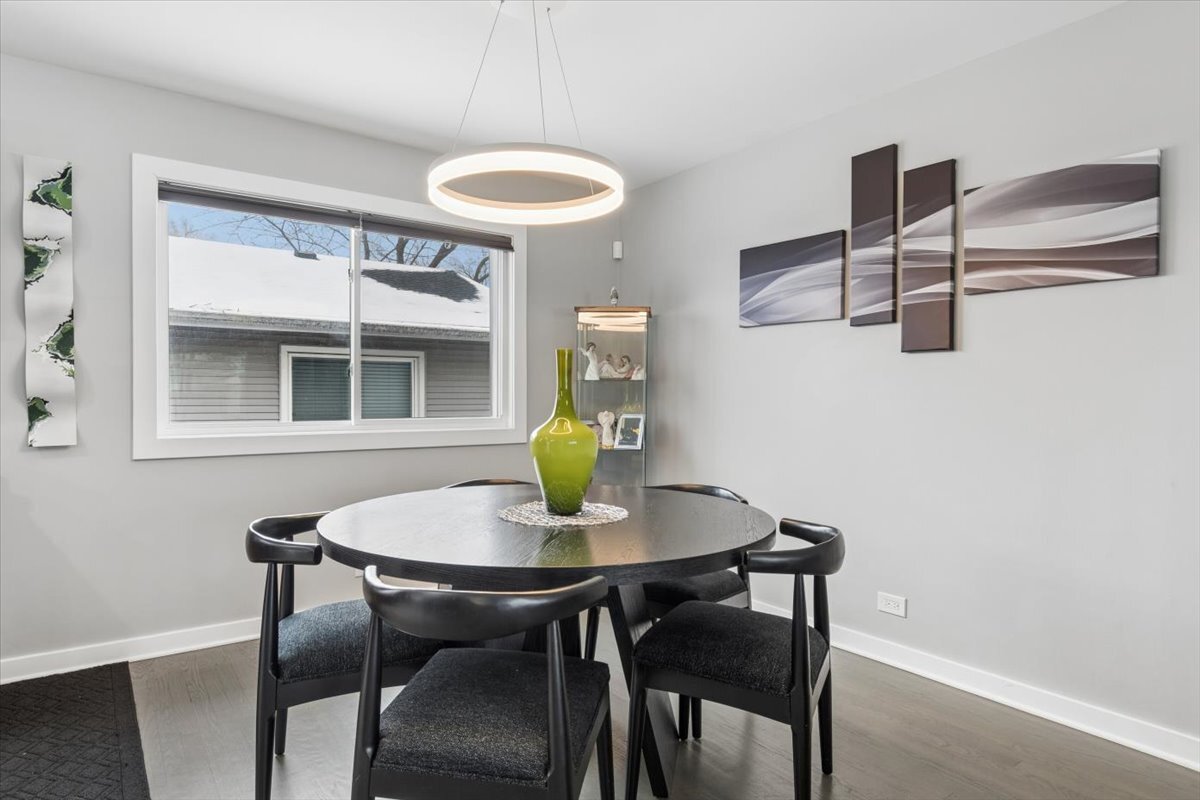 1109 Edson Avenue Lombard, IL 60148 - Photo 6 of 20 a view of a dining room with a table and chairs