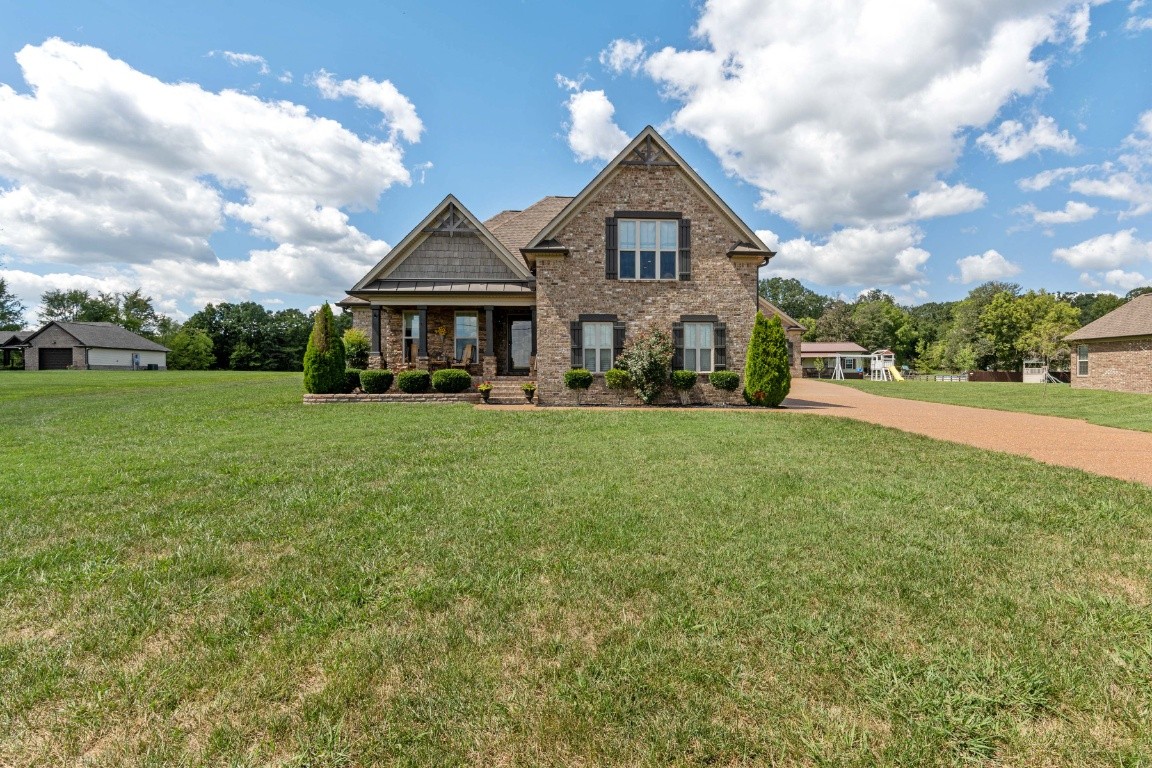 810 Burford Road Lebanon, TN 37087 - Photo 2 of 32 a view of a house with a yard