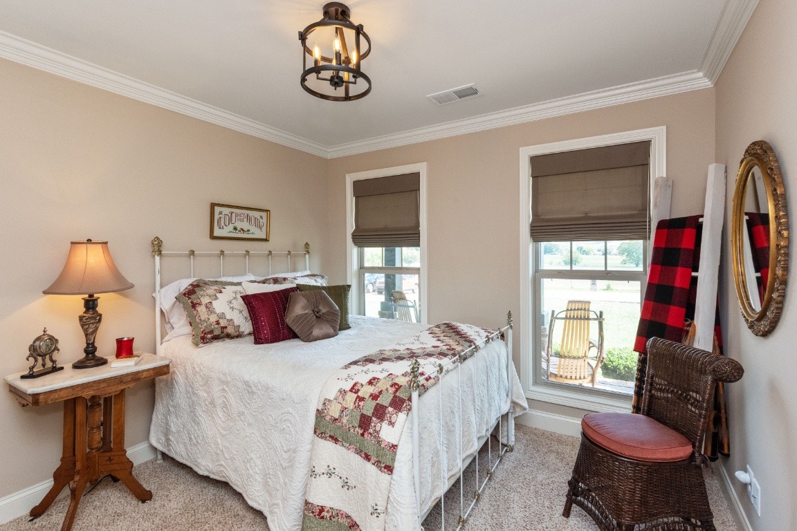 810 Burford Road Lebanon, TN 37087 - Photo 21 of 32 a bedroom with a bed and a window
