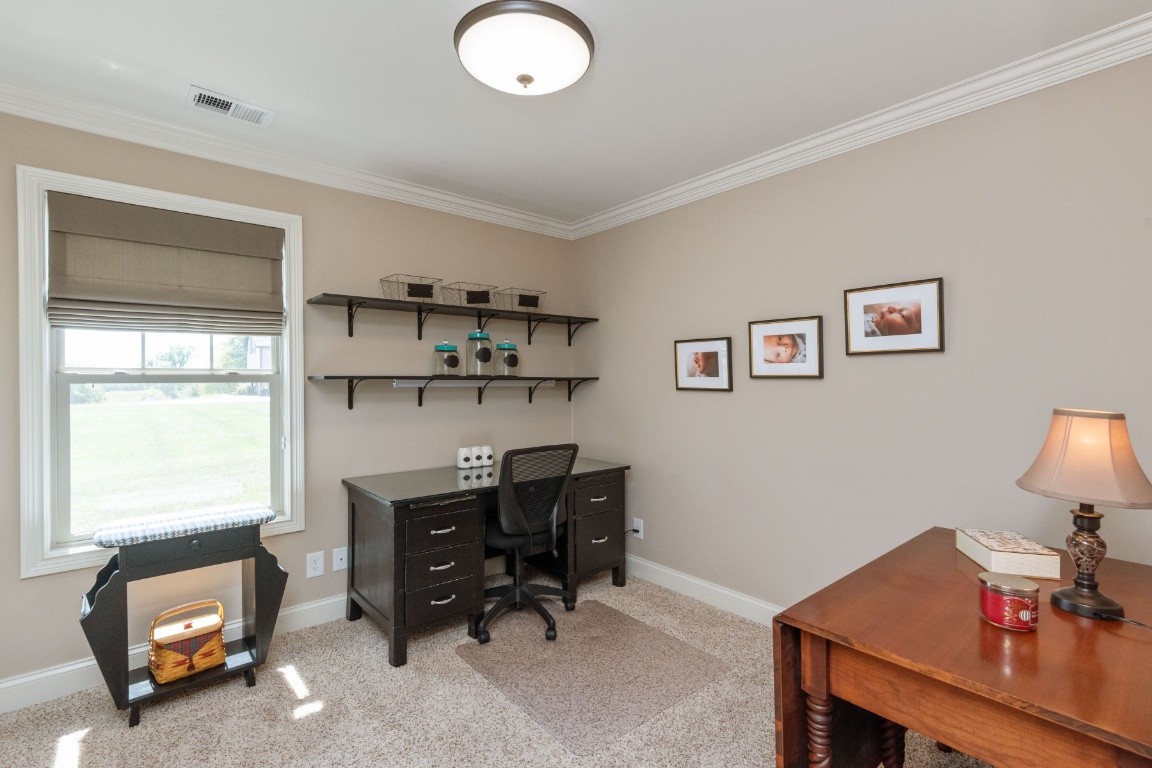 810 Burford Road Lebanon, TN 37087 - Photo 23 of 32 a view of a workspace with furniture and a window