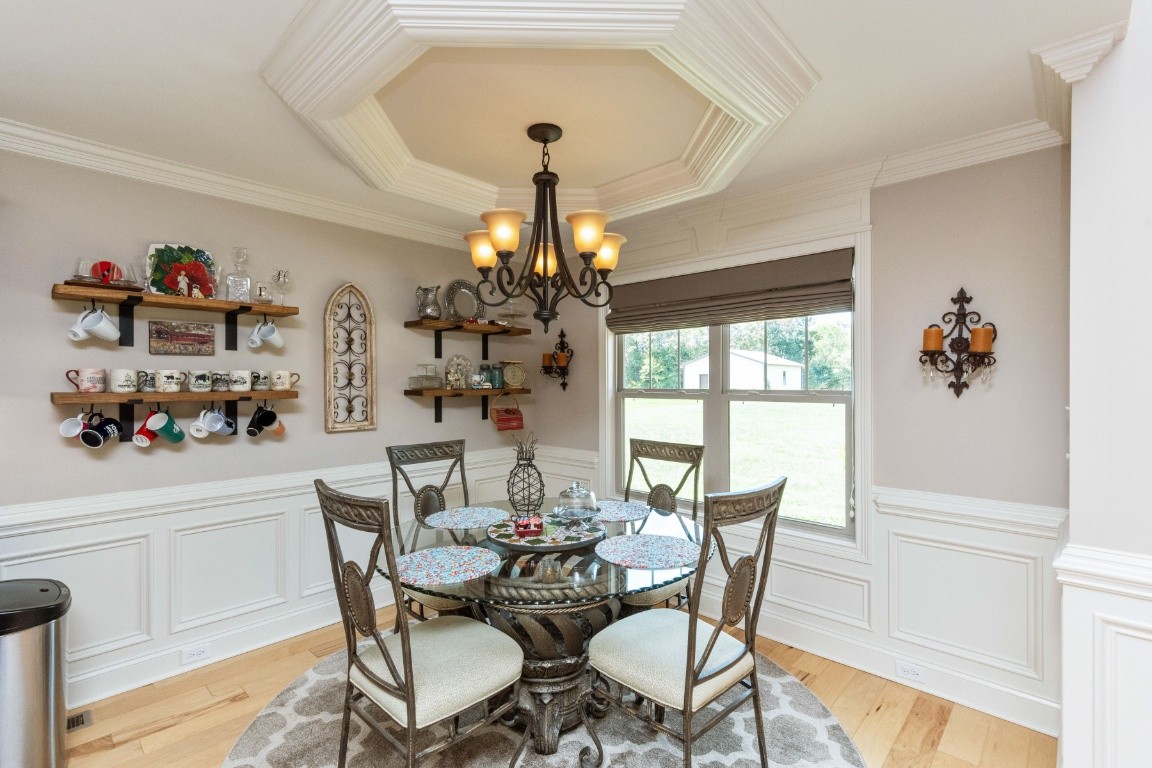 810 Burford Road Lebanon, TN 37087 - Photo 5 of 32 a dining room with furniture a chandelier and window