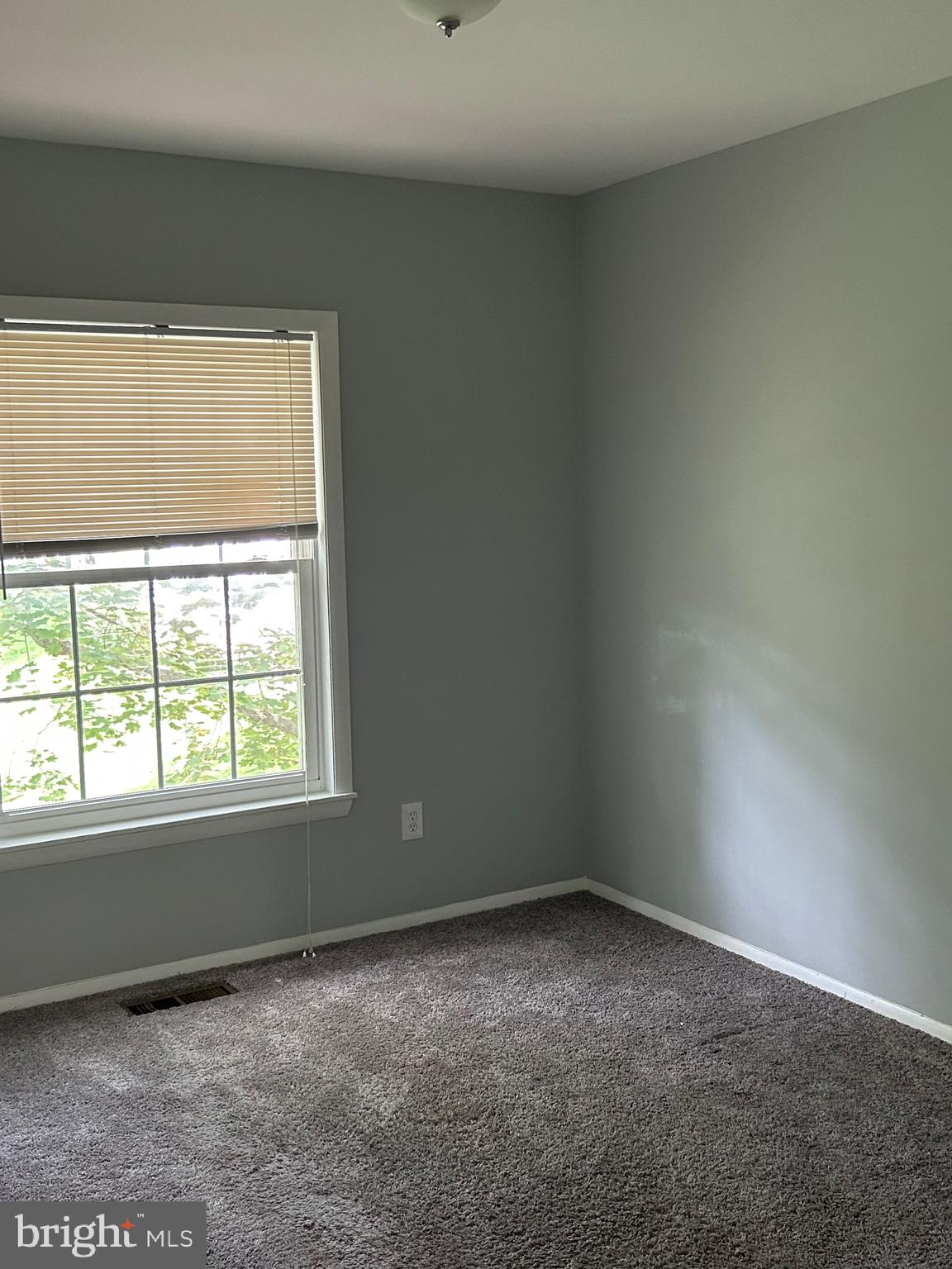 153 Hammershire Road, Unit C Reisterstown, MD 21136 - Photo 2 of 12 an empty room with a window