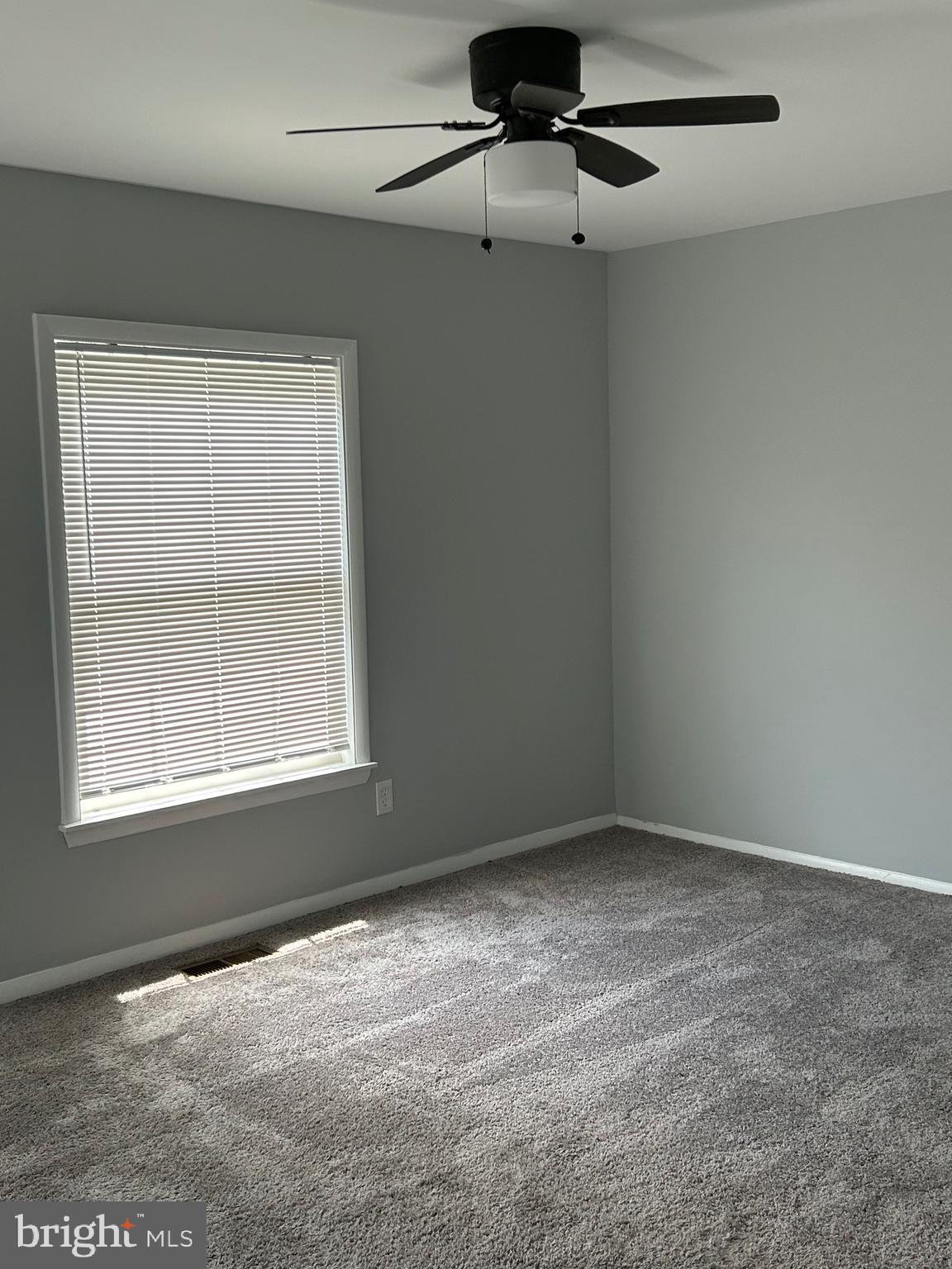 153 Hammershire Road, Unit C Reisterstown, MD 21136 - Photo 3 of 12 an empty room with a window