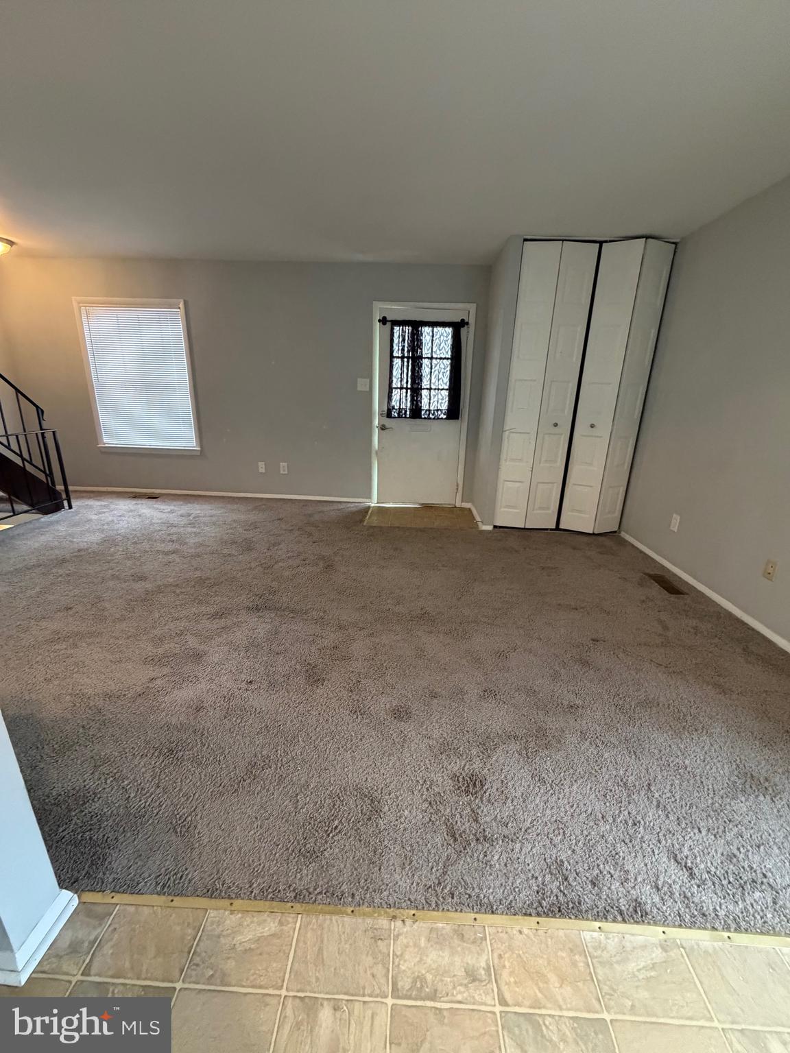 153 Hammershire Road, Unit C Reisterstown, MD 21136 - Photo 8 of 20 a view of an empty room and a window