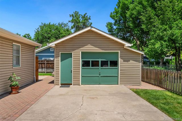 a front view of a house with a garage