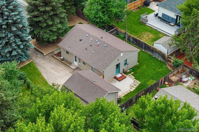 an aerial view of a house with a garden