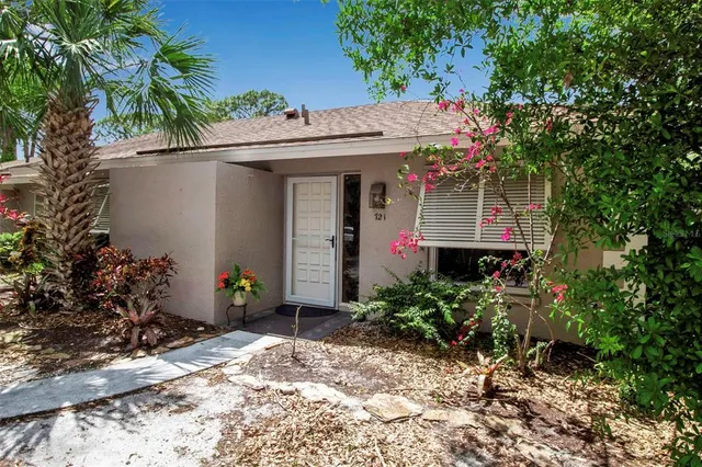 a front view of a house with a porch