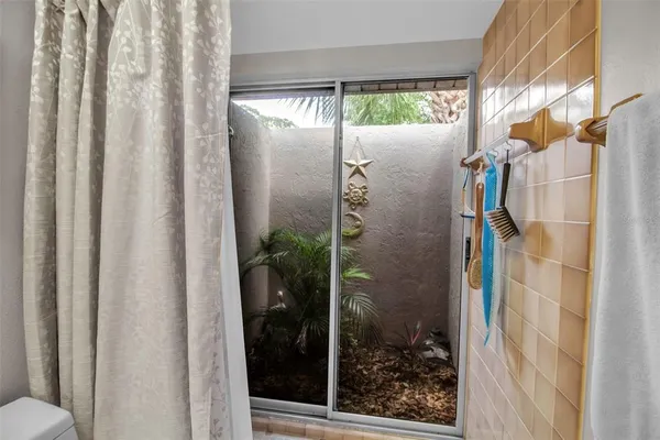 a view of a glass door with a shower