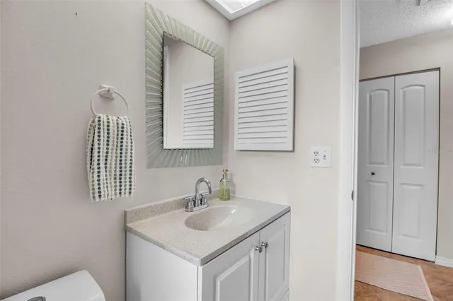 a bathroom with a sink and a toilet