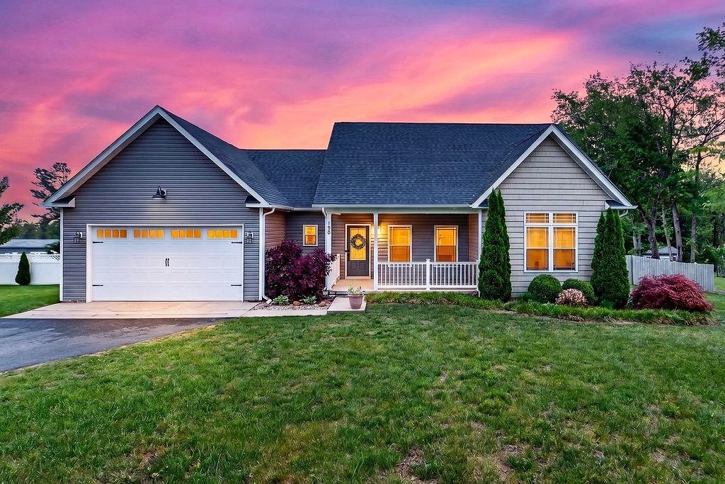 190 Montgomery Road Staunton, VA 24401 - Photo 1 of 46 a front view of a house with a yard and garage