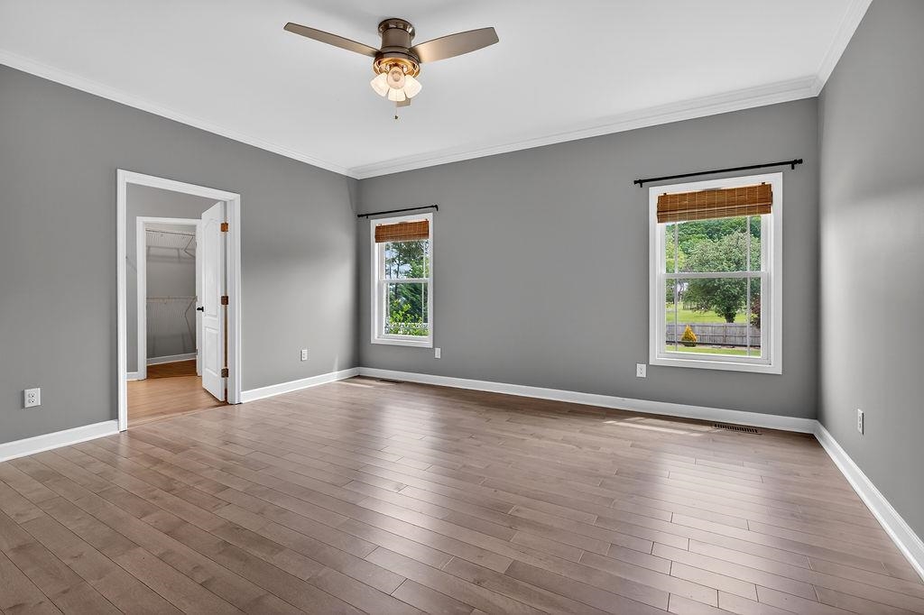 190 Montgomery Road Staunton, VA 24401 - Photo 18 of 46 a view of an empty room with a window and wooden floor
