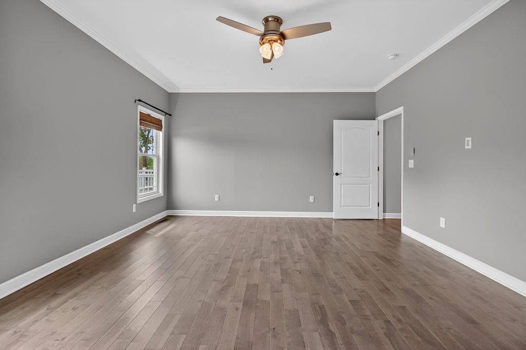 190 Montgomery Road Staunton, VA 24401 - Photo 20 of 46 an empty room with wooden floor and windows