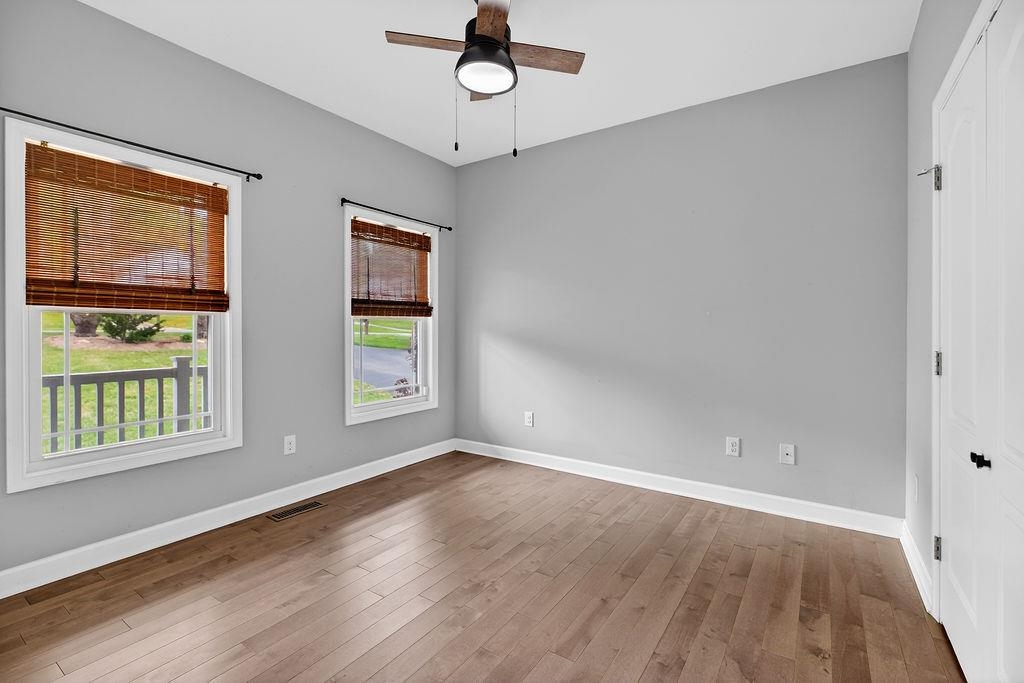 190 Montgomery Road Staunton, VA 24401 - Photo 27 of 46 wooden floor in an empty room with a window
