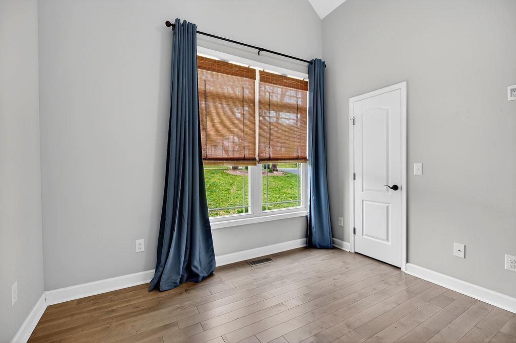 190 Montgomery Road Staunton, VA 24401 - Photo 30 of 46 an empty room with wooden floor and windows