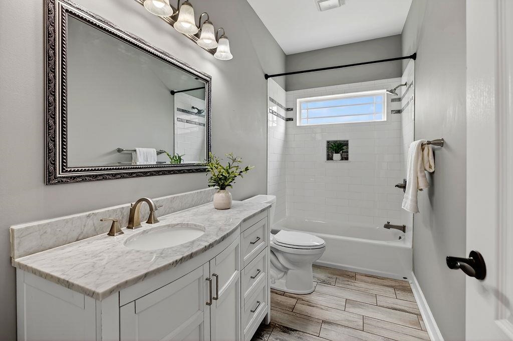190 Montgomery Road Staunton, VA 24401 - Photo 32 of 46 a bathroom with a granite countertop sink toilet and shower