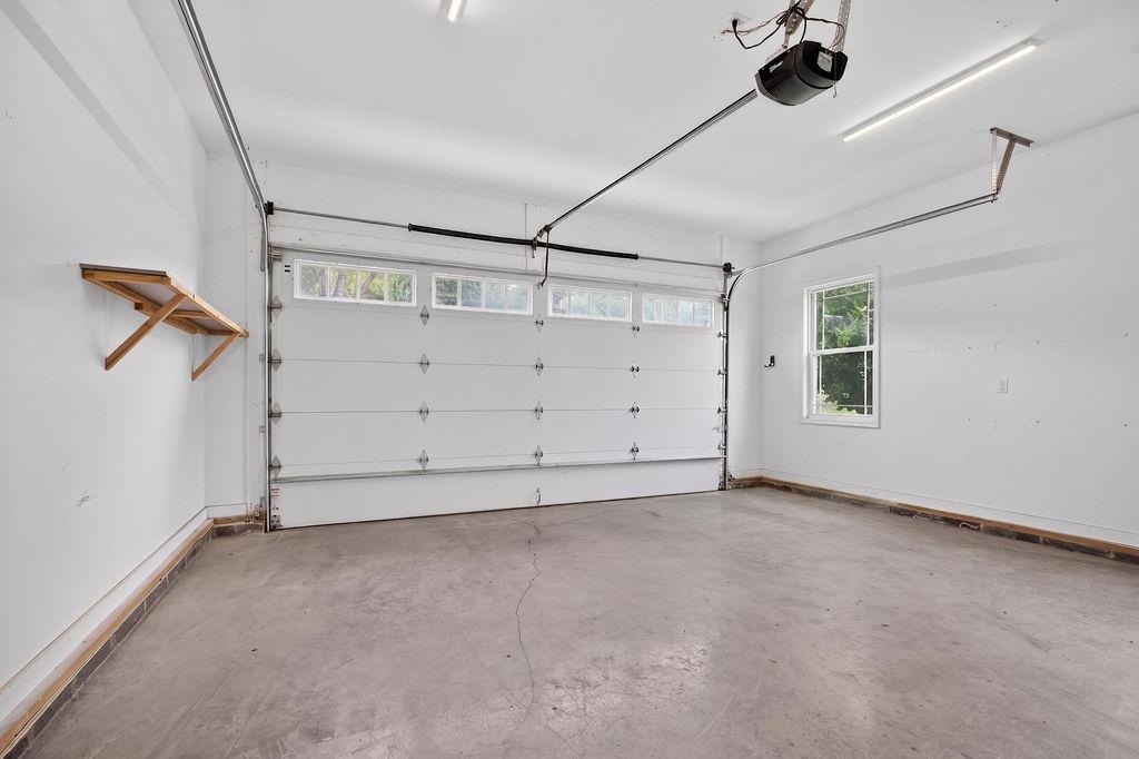 190 Montgomery Road Staunton, VA 24401 - Photo 38 of 46 an empty room with a ceiling fan and windows