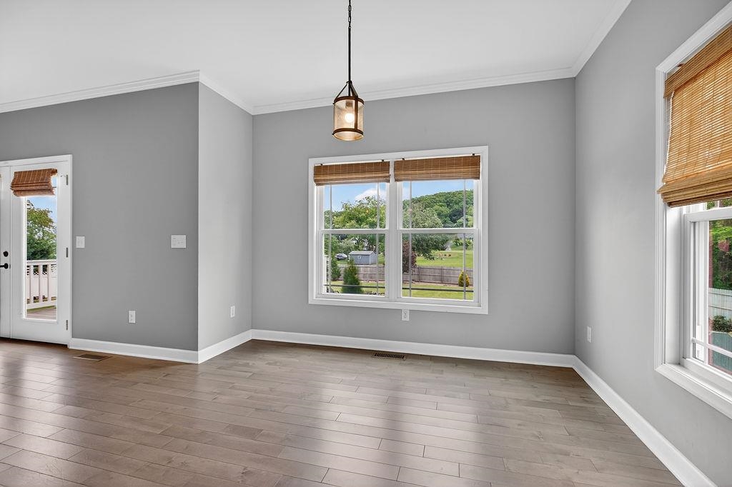 190 Montgomery Road Staunton, VA 24401 - Photo 10 of 46 a view of an empty room with wooden floor and a window