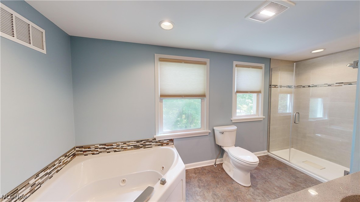 29280 White Road Wickliffe, OH 44092 - Photo 19 of 43 Master Bathroom featuring toilet and separate shower and tub