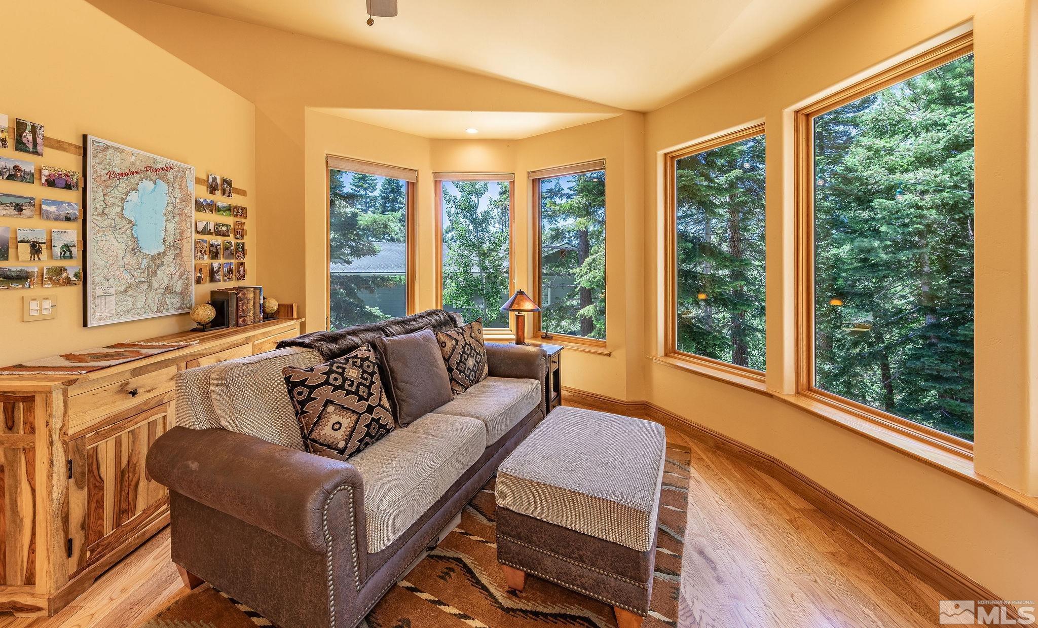 228 Sunflower Circle Stateline, NV 89449 - Photo 11 of 40 a living room with furniture and a large window