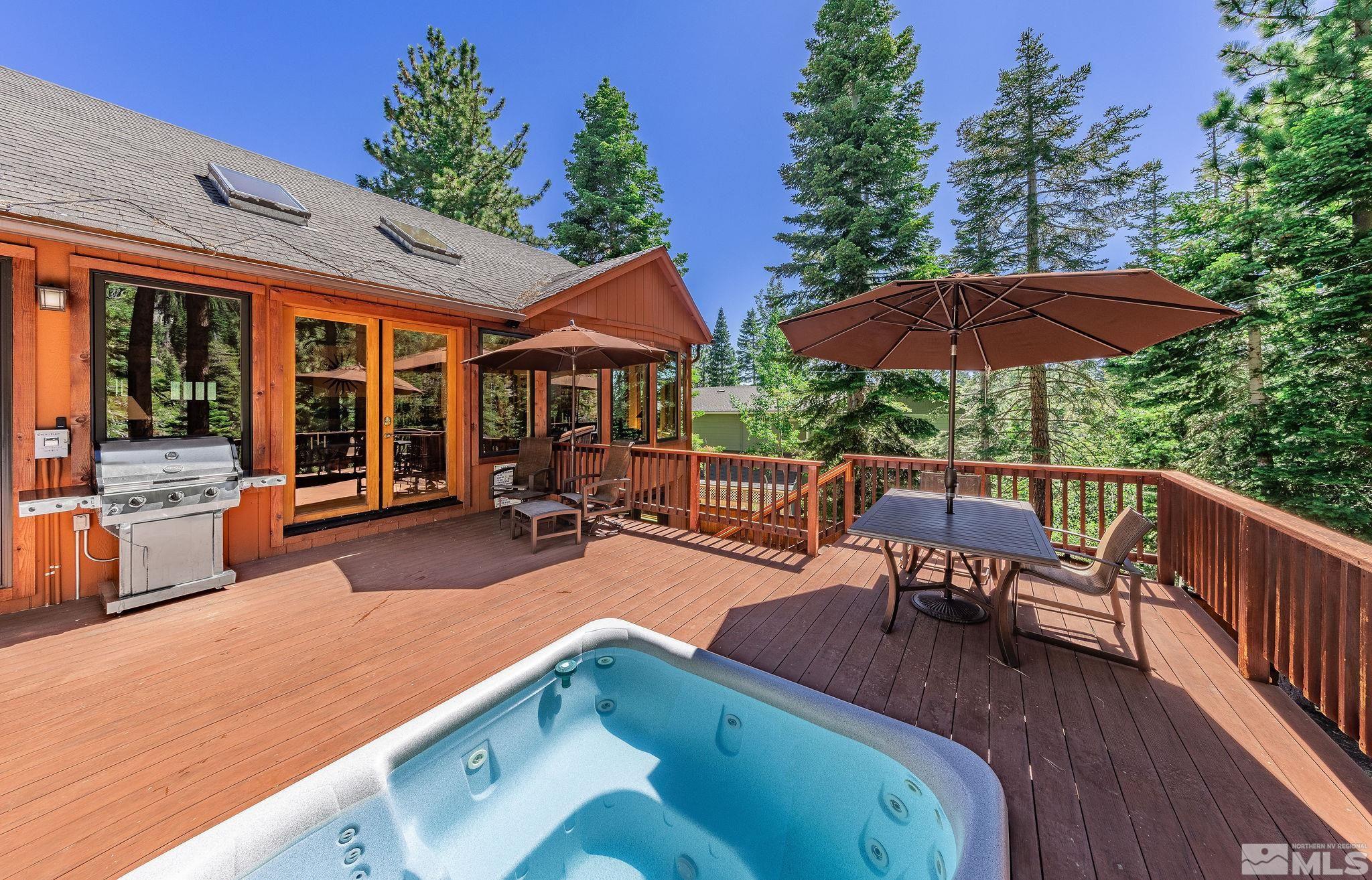228 Sunflower Circle Stateline, NV 89449 - Photo 12 of 40 a view of a patio with chairs and potted plants