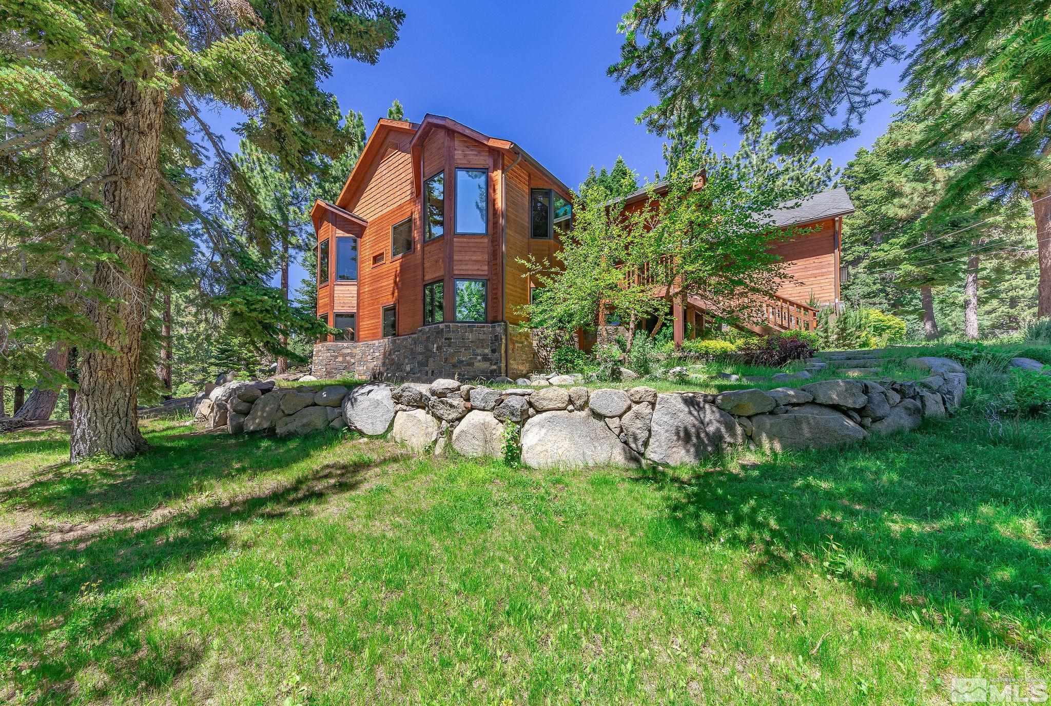 228 Sunflower Circle Stateline, NV 89449 - Photo 29 of 40 a view of backyard with garden and outdoor seating