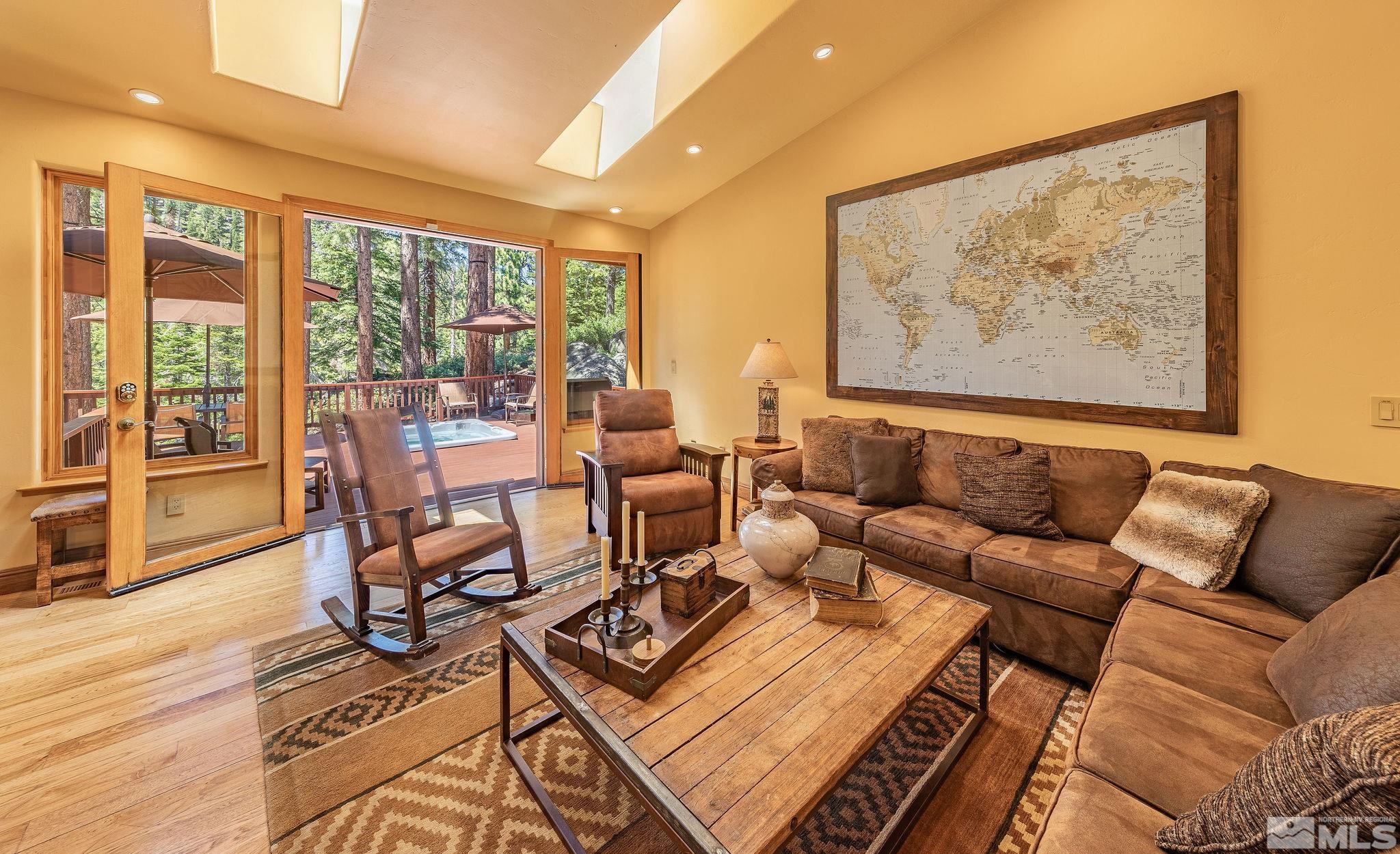 228 Sunflower Circle Stateline, NV 89449 - Photo 3 of 40 a living room with furniture and a large window