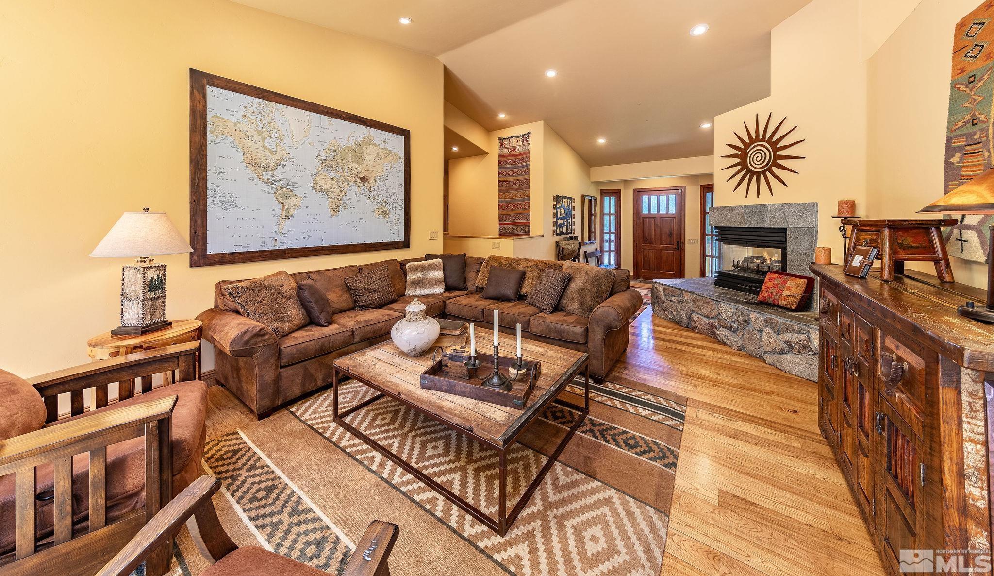 228 Sunflower Circle Stateline, NV 89449 - Photo 4 of 40 a living room with furniture and a fireplace