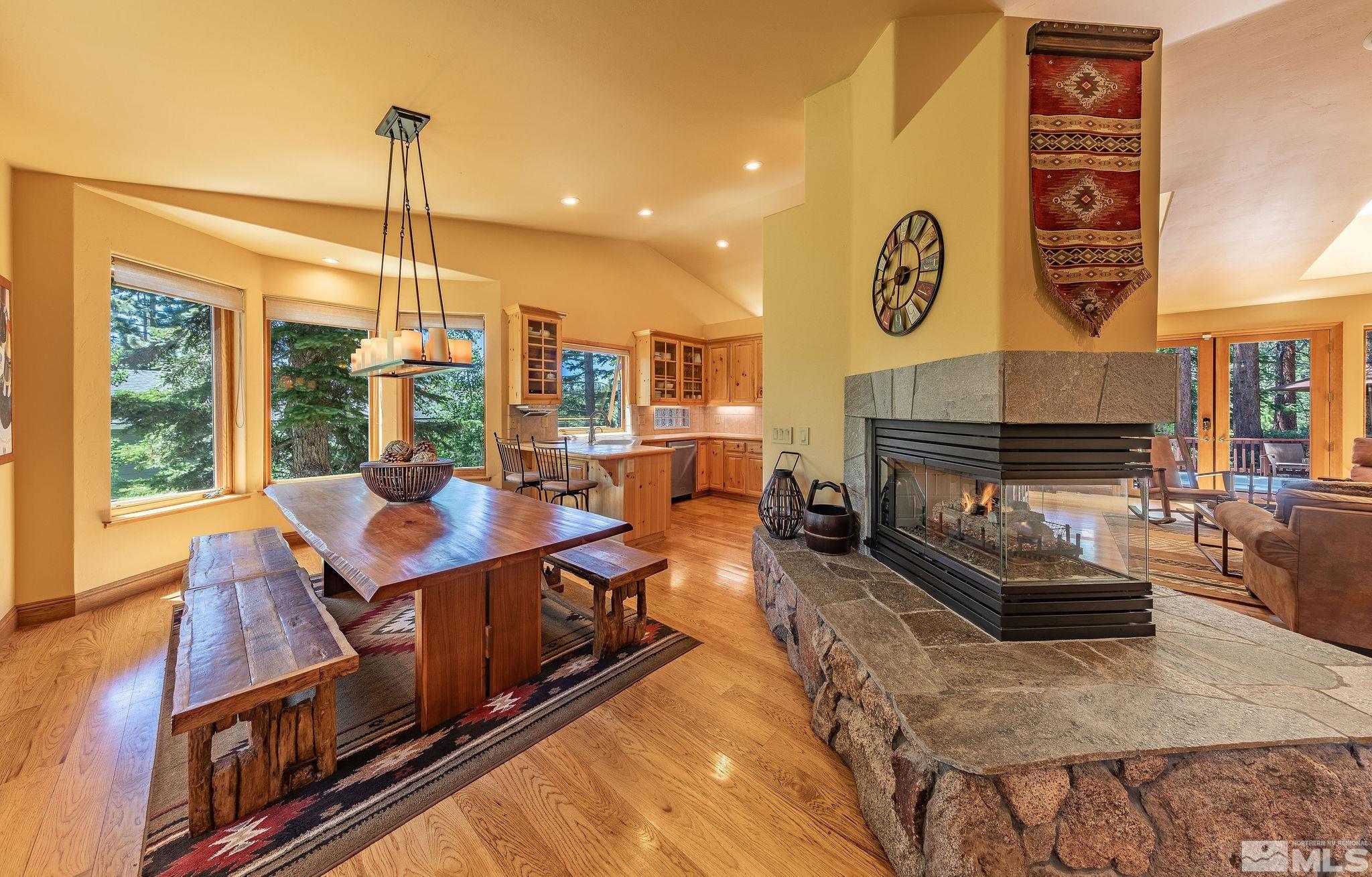 228 Sunflower Circle Stateline, NV 89449 - Photo 7 of 40 a living room with furniture and a floor to ceiling window