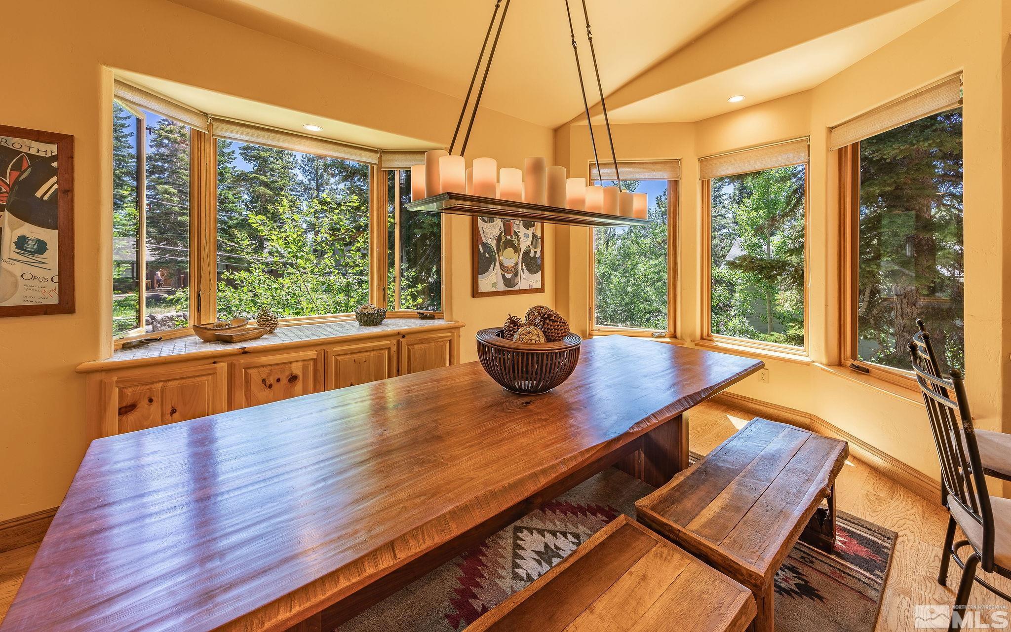 228 Sunflower Circle Stateline, NV 89449 - Photo 8 of 40 a room with wooden floor and a window