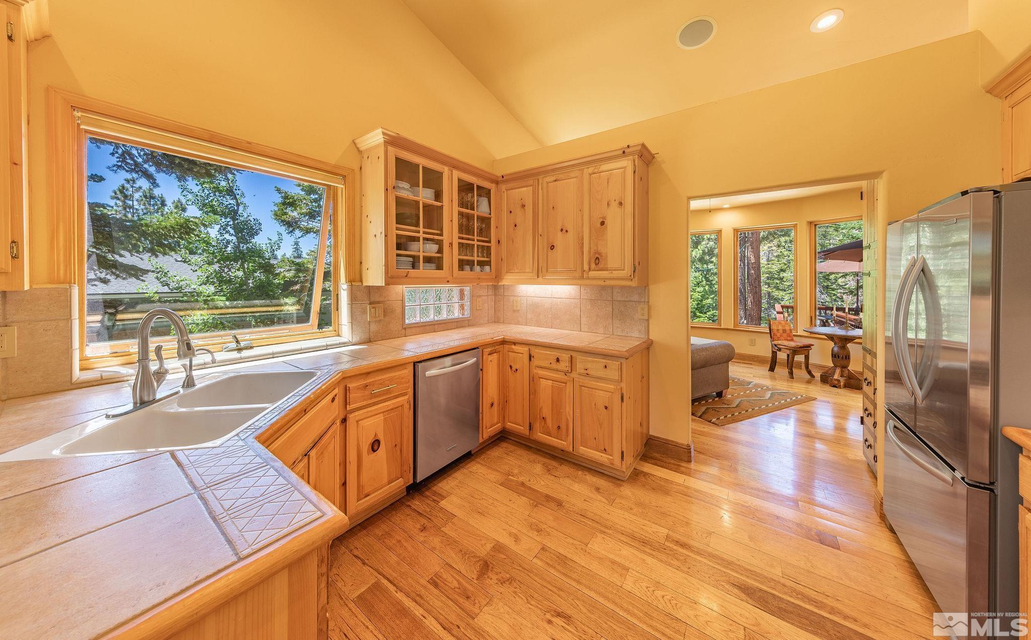 228 Sunflower Circle Stateline, NV 89449 - Photo 10 of 40 a view of a kitchen with a large window