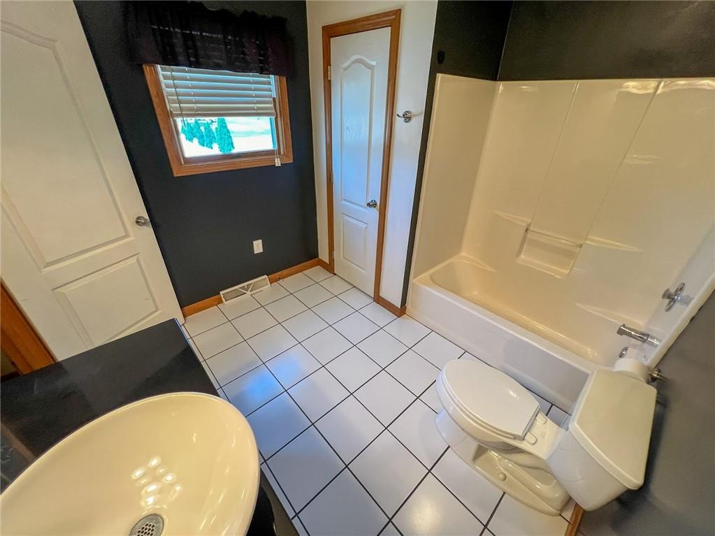 167 Moore Road Butler, PA 16001 - Photo 19 of 50 a bathroom with a sink and a mirror