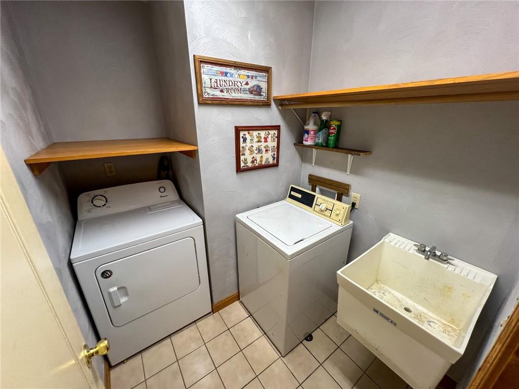 167 Moore Road Butler, PA 16001 - Photo 21 of 50 a utility room with dryer and washer