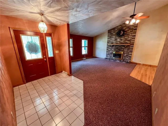 a view of a livingroom with a fireplace